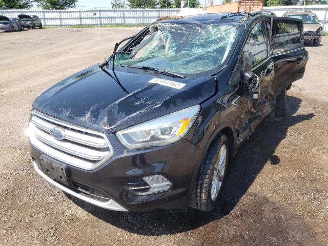 Photo 2 from auction – 2017 FORD ESCAPE TIT with VIN 1FMCU0J97HUA97664