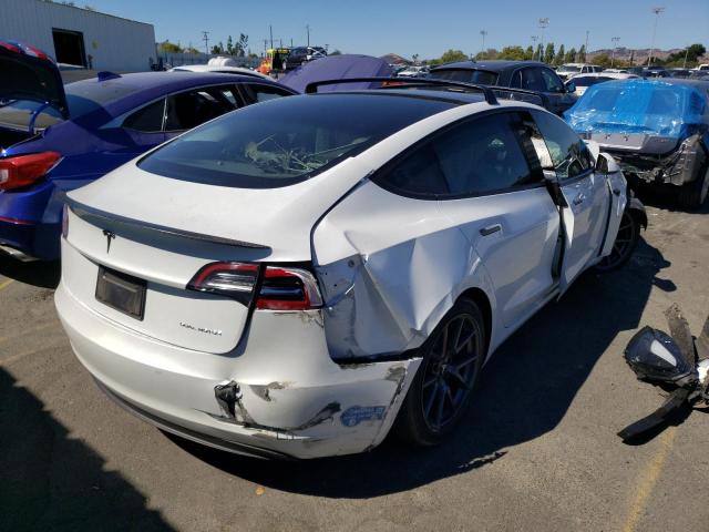 Photo 4 from auction – 2021 TESLA MODEL 3 with VIN 5YJ3E1EB5MF876200