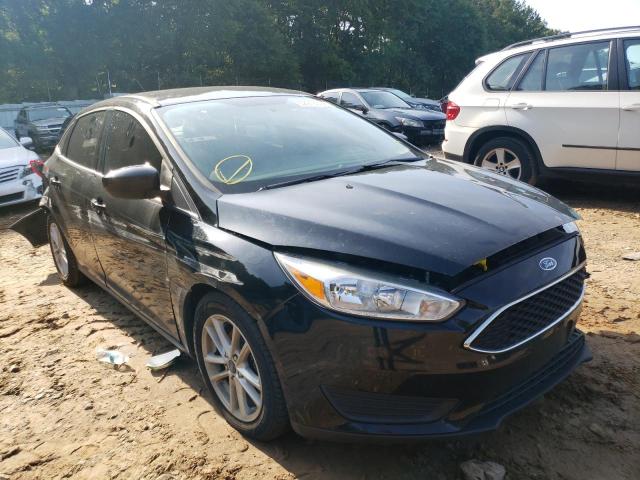 FORD FOCUS SE 2018 with VIN 1FADP3FEXJL303326 - Photo from auction