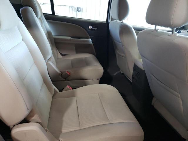 Photo 6 from auction – 2008 FORD TAURUS X S with VIN 1FMDK02W68GA29398
