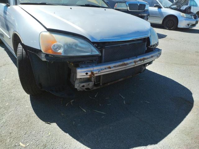 Photo 9 from auction – 2002 HONDA CIVIC LX with VIN 1HGES165X2L069161