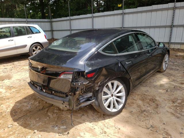 Photo 4 from auction – 2018 TESLA MODEL 3 with VIN 5YJ3E1EA9JF014987