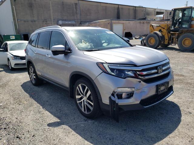 Photo 1 from auction – 2016 HONDA PILOT TOUR with VIN 5FNYF5H95GB048249