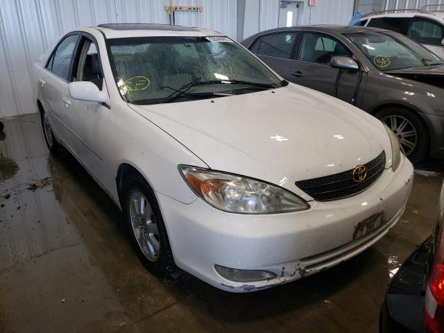 TOYOTA CAMRY LE 2003 with VIN 4T1BE30K83U214272 - Photo from auction