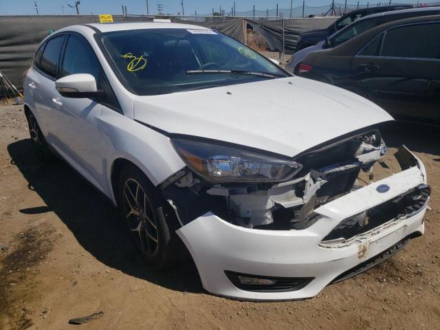 FORD FOCUS SEL 2017 with VIN 1FADP3M20HL292968 - Photo from auction