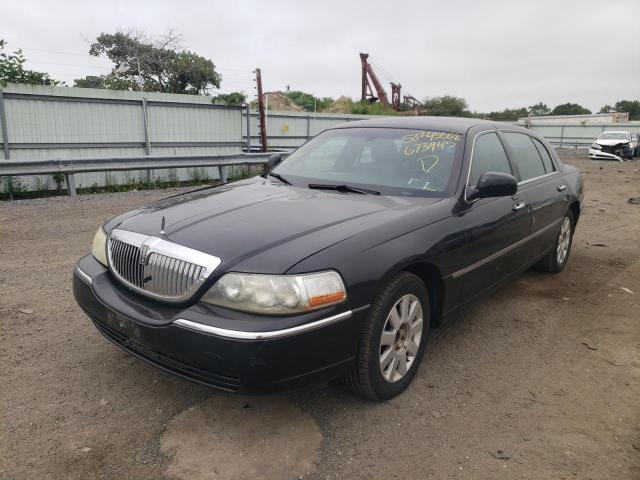 Photo 2 from auction – 2004 LINCOLN TOWN CAR E with VIN 1LNHM84W24Y673945