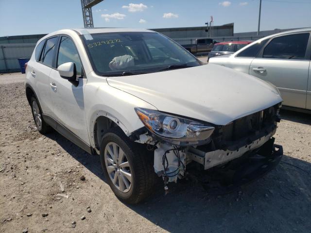 MAZDA CX-5 GT 2014 with VIN JM3KE4DY9E0302001 - Photo from auction
