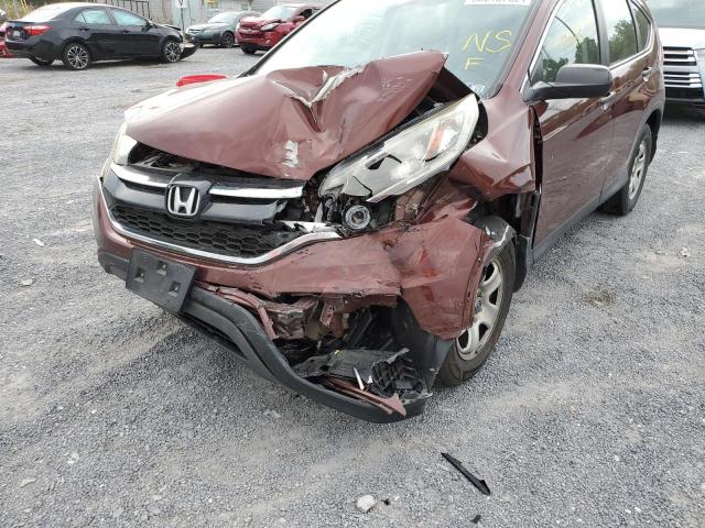 Photo 9 from auction – 2015 HONDA CR-V LX with VIN 2HKRM4H38FH609737