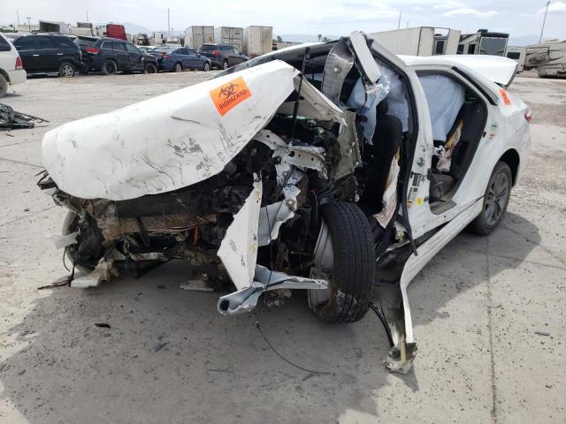 Photo 2 from auction – 2016 TOYOTA CAMRY HYBR with VIN 4T1BD1FK0GU190764