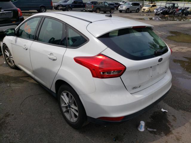 Photo 3 from auction – 2018 FORD FOCUS SE with VIN 1FADP3K21JL315909