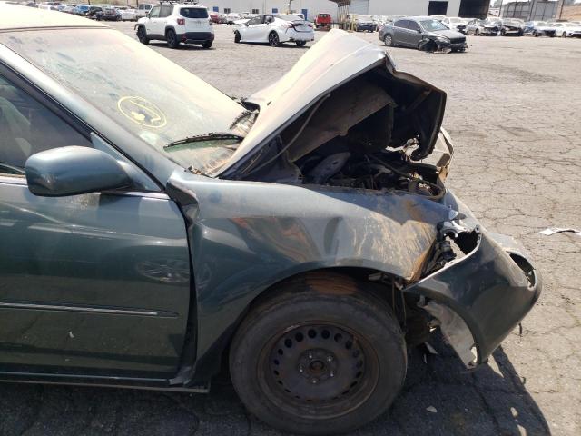 Photo 9 from auction – 2003 TOYOTA CAMRY LE with VIN JTDBE32K530163564