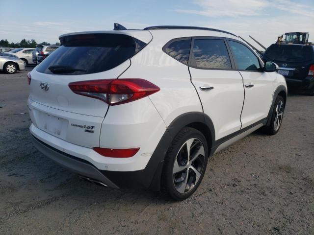 Photo 4 from auction – 2018 HYUNDAI TUCSON VAL with VIN KM8J3CA23JU825579