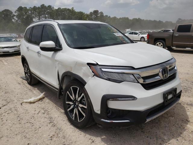 HONDA PILOT TOUR 2022 with VIN 5FNYF5H95NB003986 - Photo from auction