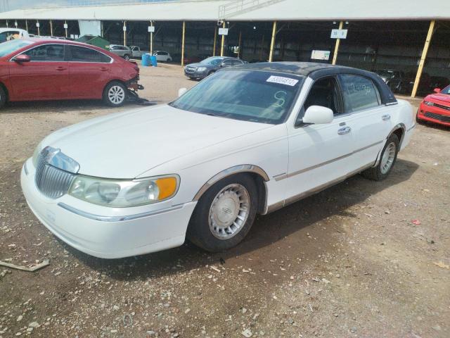 Photo 2 from auction – 2001 LINCOLN TOWN CAR E with VIN 1LNHM81W61Y729966
