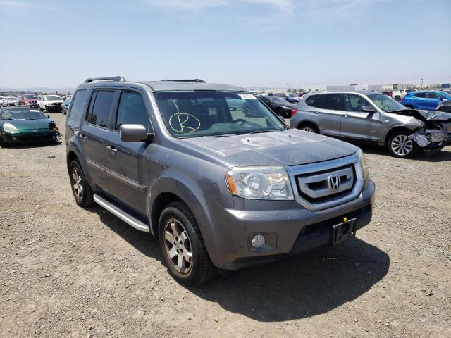 HONDA PILOT TOUR 2010 with VIN 5FNYF4H97AB004397 - Photo from auction