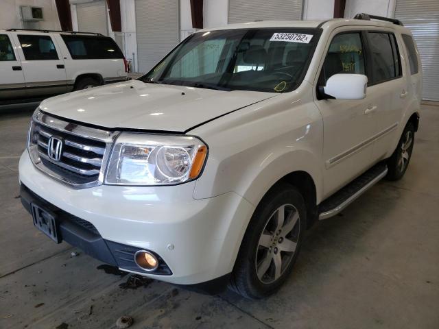 Photo 2 from auction – 2014 HONDA PILOT TOUR with VIN 5FNYF4H99EB035141