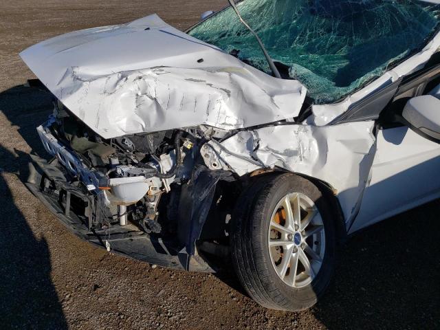 Photo 9 from auction – 2015 FORD FOCUS SE with VIN 1FADP3F26FL257927