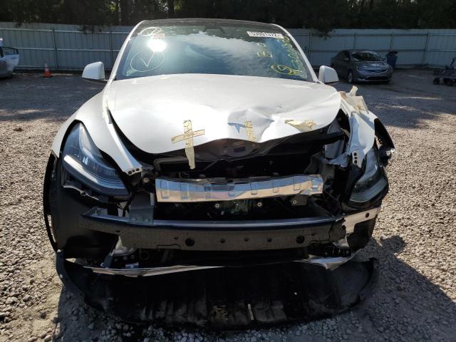 Photo 9 from auction – 2021 TESLA MODEL Y with VIN 5YJYGAEE9MF295275