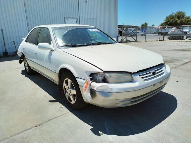 TOYOTA CAMRY CE 2001 with VIN JT2BG22K410564873 - Photo from auction