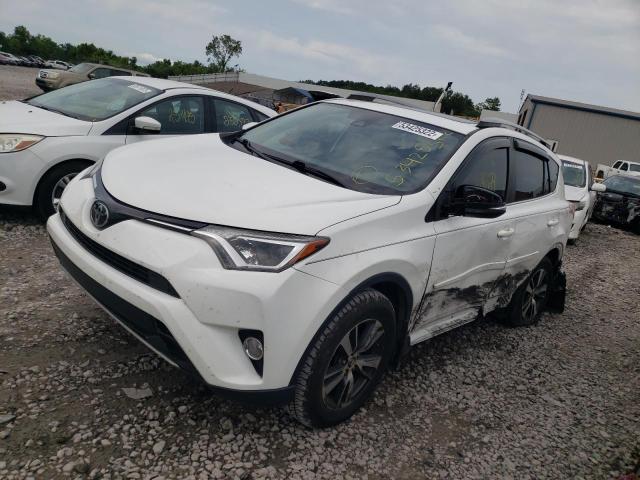 Photo 2 from auction – 2017 TOYOTA RAV4 XLE with VIN JTMWFREV0HD099599