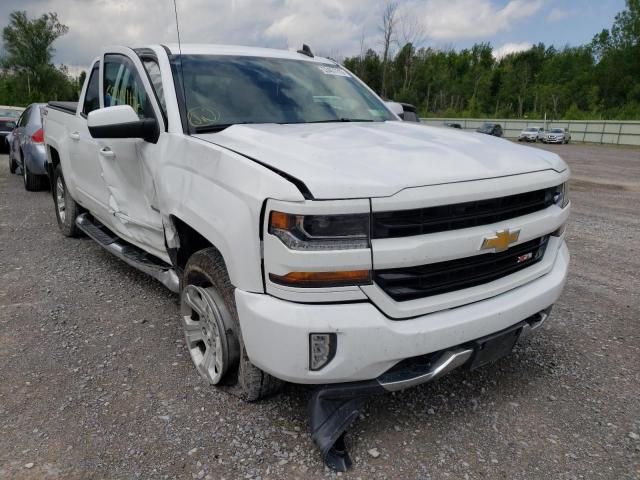 CHEVROLET SILVERADO 2018 with VIN 3GCUKREC3JG469146 - Photo from auction