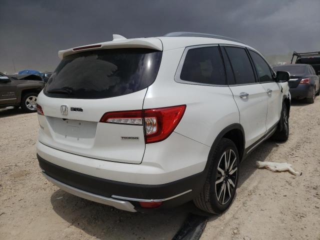 Photo 4 from auction – 2022 HONDA PILOT TOUR with VIN 5FNYF5H95NB003986