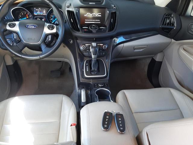 Photo 5 from auction – 2014 FORD ESCAPE TIT with VIN 1FMCU9JX3EUA86515
