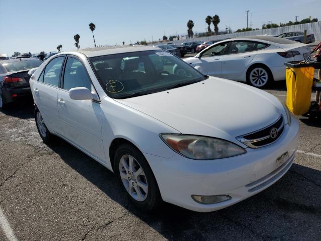 TOYOTA CAMRY LE 2004 with VIN JTDBE32K240279628 - Photo from auction