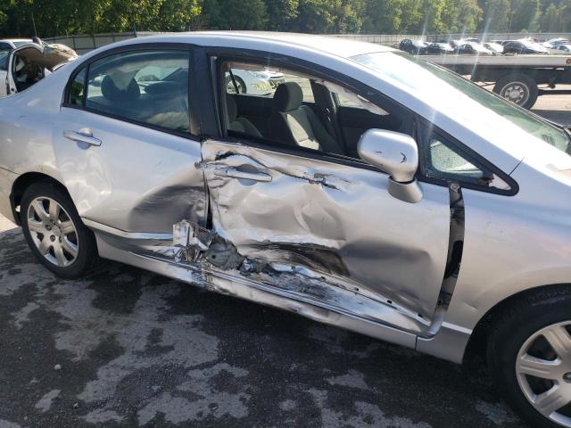 Photo 9 from auction – 2011 HONDA CIVIC LX with VIN 19XFA1F52BE040168