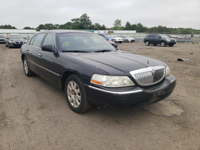 LINCOLN TOWN CAR E 2004 with VIN 1LNHM84W24Y673945 - Photo from auction