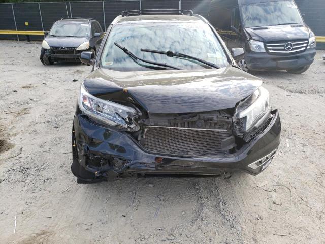 Photo 9 from auction – 2015 HONDA CR-V EXL with VIN 2HKRM4H73FH659738
