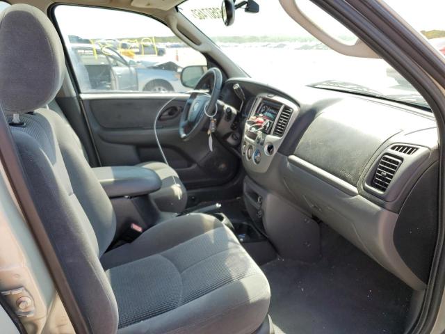 Photo 5 from auction – 2004 MAZDA TRIBUTE LX with VIN 4F2YZ04124KM25015