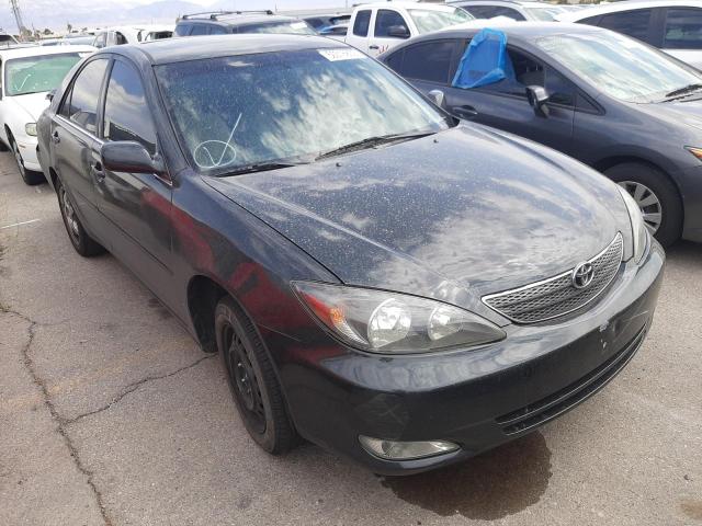 TOYOTA CAMRY LE 2002 with VIN 4T1BE32KX2U573134 - Photo from auction