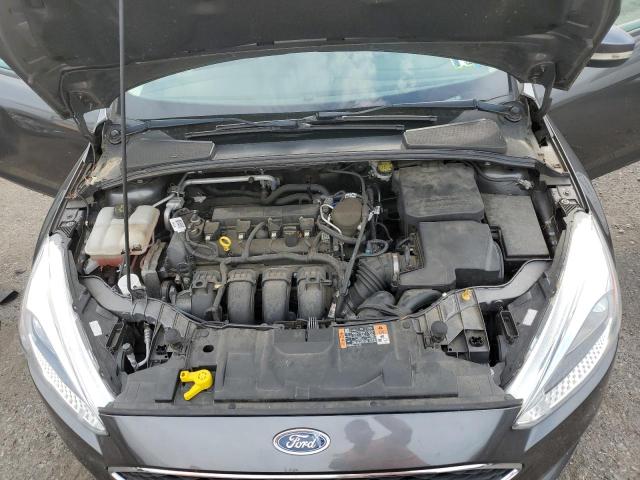 Photo 7 from auction – 2015 FORD FOCUS SE with VIN 1FADP3F27FL353405