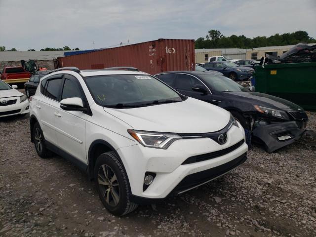 TOYOTA RAV4 XLE 2017 with VIN JTMWFREV0HD099599 - Photo from auction
