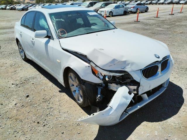 BMW 530 I 2006 with VIN WBANE73546CM39083 - Photo from auction