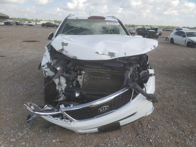 Photo 9 from auction – 2015 KIA SORENTO LX with VIN 5XYKT3A64FG552902