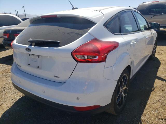 Photo 4 from auction – 2017 FORD FOCUS SEL with VIN 1FADP3M20HL292968