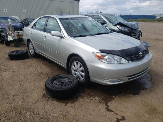 TOYOTA CAMRY LE 2002 with VIN JTDBF30K020002912 - Photo from auction