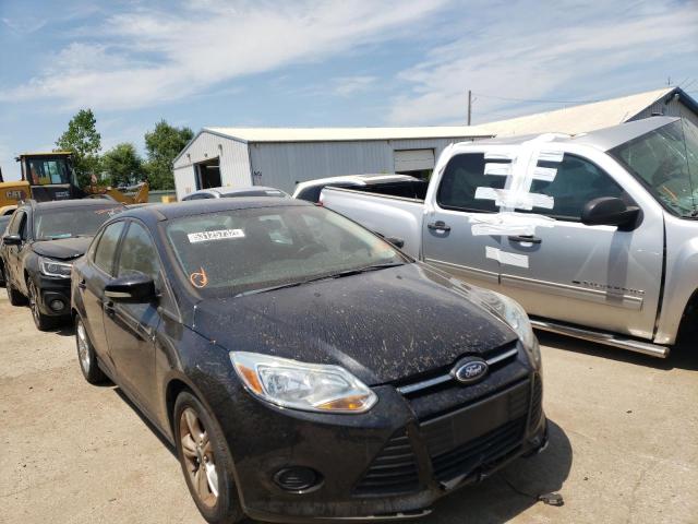 FORD FOCUS SE 2014 with VIN 1FADP3F23EL209784 - Photo from auction