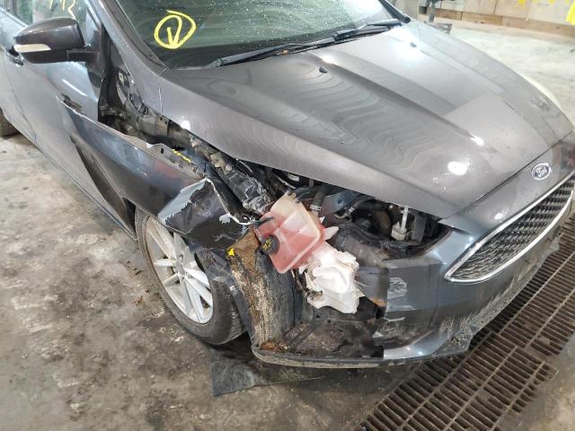 Photo 9 from auction – 2015 FORD FOCUS SE with VIN 1FADP3F28FL210673