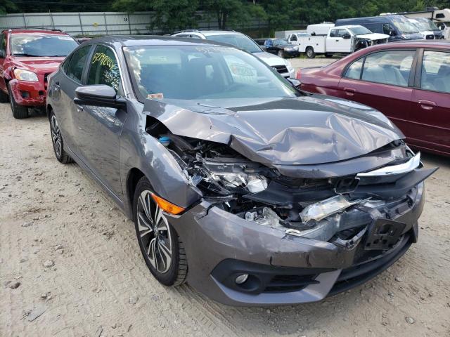 HONDA CIVIC EX 2018 with VIN 19XFC1E35JE003429 - Photo from auction
