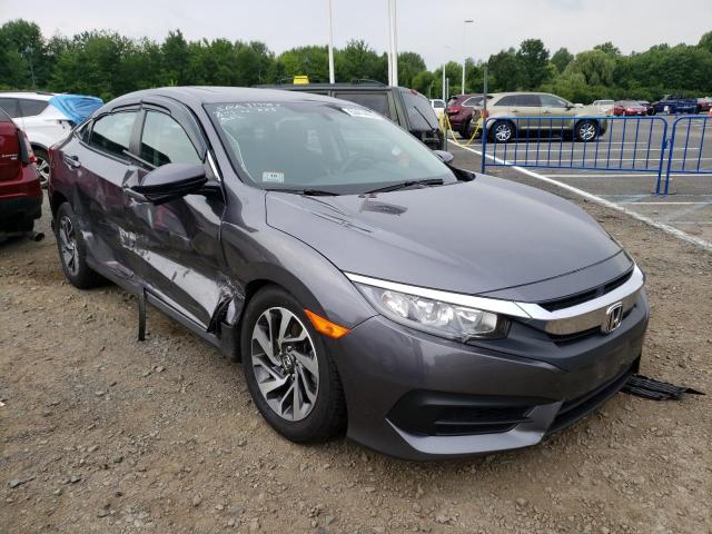 HONDA CIVIC EX 2018 with VIN 2HGFC2F71JH580813 - Photo from auction