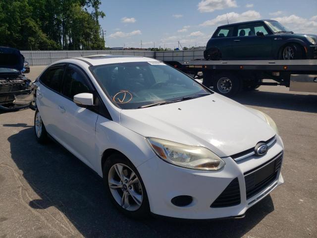 FORD FOCUS SE 2014 with VIN 1FADP3F25EL147272 - Photo from auction