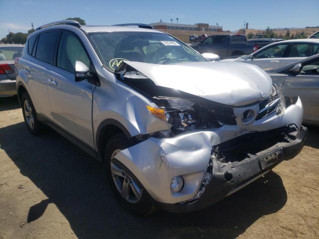 TOYOTA RAV4 XLE 2015 with VIN JTMRFREV1FJ030335 - Photo from auction