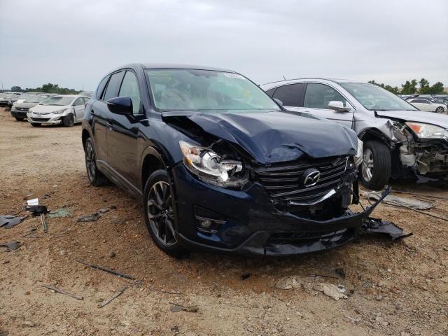 MAZDA CX-5 GT 2016 with VIN JM3KE2DY9G0705600 - Photo from auction