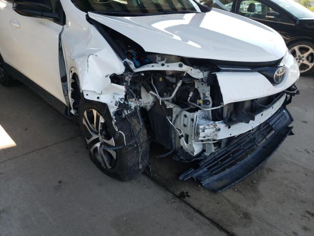 Photo 9 from auction – 2017 TOYOTA RAV4 LE with VIN JTMBFREV2HJ143215