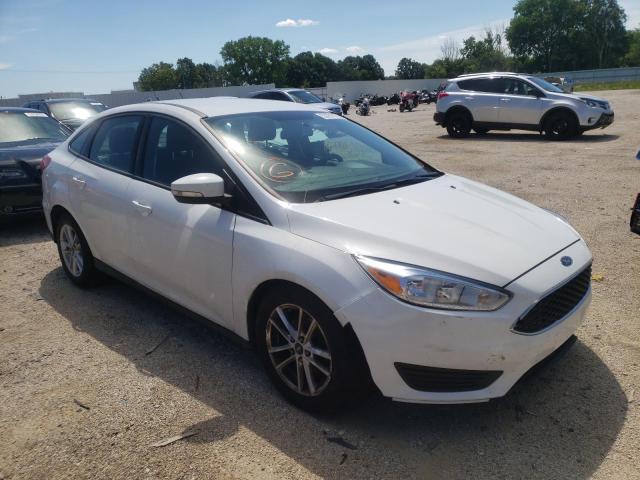 FORD FOCUS SE 2015 with VIN 1FADP3F24FL249678 - Photo from auction