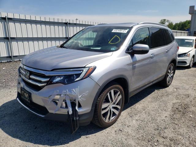 Photo 2 from auction – 2016 HONDA PILOT TOUR with VIN 5FNYF5H95GB048249