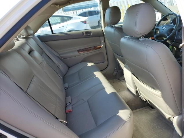 Photo 6 from auction – 2004 TOYOTA CAMRY LE with VIN JTDBE32K240279628